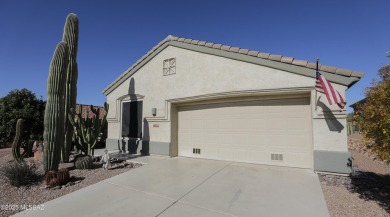 Popular Portland model home on the Fourth Hole of the Highlands on Heritage Highlands At Dove Mountain in Arizona - for sale on GolfHomes.com, golf home, golf lot