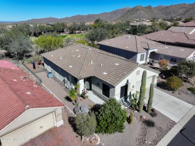 Popular Portland model home on the Fourth Hole of the Highlands on Heritage Highlands At Dove Mountain in Arizona - for sale on GolfHomes.com, golf home, golf lot