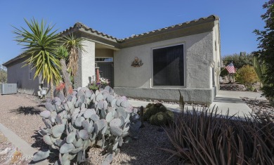 Popular Portland model home on the Fourth Hole of the Highlands on Heritage Highlands At Dove Mountain in Arizona - for sale on GolfHomes.com, golf home, golf lot