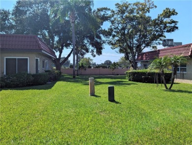 Centrally located 55+ community in popular Pinewood Village on Clearwater Executive Golf Course in Florida - for sale on GolfHomes.com, golf home, golf lot