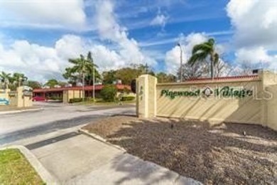 Centrally located 55+ community in popular Pinewood Village on Clearwater Executive Golf Course in Florida - for sale on GolfHomes.com, golf home, golf lot