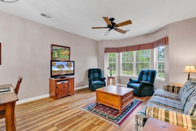 Discover the charm of this Scottish-American inspired condo at on Legends Golf Club in South Carolina - for sale on GolfHomes.com, golf home, golf lot