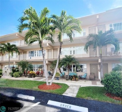 LOCATION, LOCATION, LOCATION. THIS IS A FANTASTIC CORNER UNIT on Pompano Beach Golf Course  in Florida - for sale on GolfHomes.com, golf home, golf lot