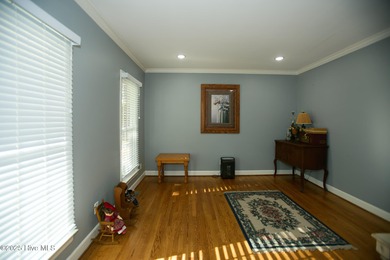 Located on a corner lot at Wilson Country Club overlooking Hole on Wilson Country Club in North Carolina - for sale on GolfHomes.com, golf home, golf lot