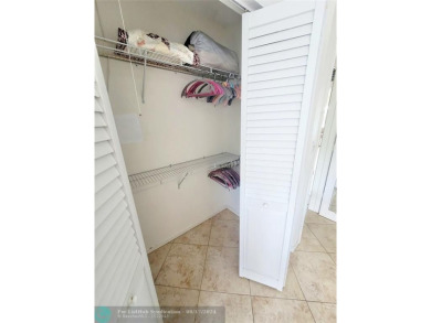 LOCATION, LOCATION, LOCATION. THIS IS A FANTASTIC CORNER UNIT on Pompano Beach Golf Course  in Florida - for sale on GolfHomes.com, golf home, golf lot