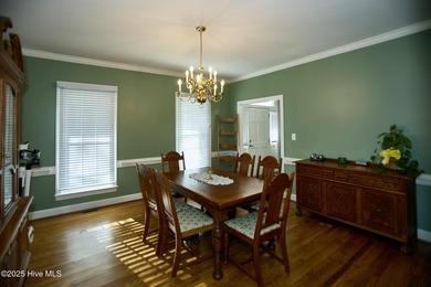 Located on a corner lot at Wilson Country Club overlooking Hole on Wilson Country Club in North Carolina - for sale on GolfHomes.com, golf home, golf lot