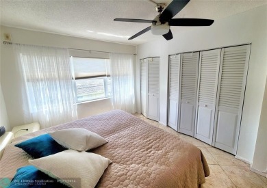 LOCATION, LOCATION, LOCATION. THIS IS A FANTASTIC CORNER UNIT on Pompano Beach Golf Course  in Florida - for sale on GolfHomes.com, golf home, golf lot