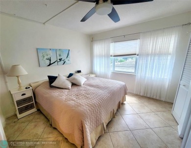 LOCATION, LOCATION, LOCATION. THIS IS A FANTASTIC CORNER UNIT on Pompano Beach Golf Course  in Florida - for sale on GolfHomes.com, golf home, golf lot