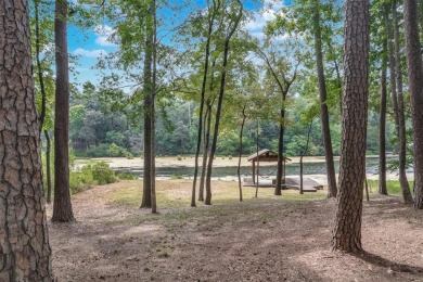 Stunning waterfront home on 2.7 acres in highly sought-after on Holly Lake Ranch Golf Club in Texas - for sale on GolfHomes.com, golf home, golf lot