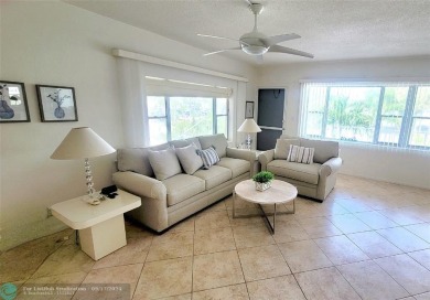 LOCATION, LOCATION, LOCATION. THIS IS A FANTASTIC CORNER UNIT on Pompano Beach Golf Course  in Florida - for sale on GolfHomes.com, golf home, golf lot