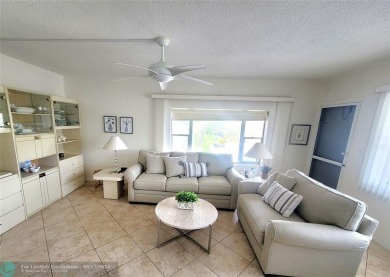 LOCATION, LOCATION, LOCATION. THIS IS A FANTASTIC CORNER UNIT on Pompano Beach Golf Course  in Florida - for sale on GolfHomes.com, golf home, golf lot