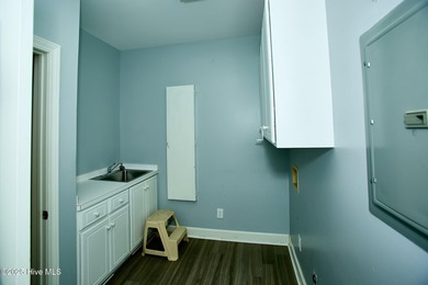 Located on a corner lot at Wilson Country Club overlooking Hole on Wilson Country Club in North Carolina - for sale on GolfHomes.com, golf home, golf lot