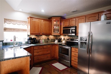 Nestled along the serene fairway of a popular golf course, this on Country Club of Mount Dora in Florida - for sale on GolfHomes.com, golf home, golf lot