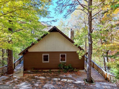 Darling Bavarian style chalet with a great view in the beautiful on Sky Valley Resort and Country Club in Georgia - for sale on GolfHomes.com, golf home, golf lot