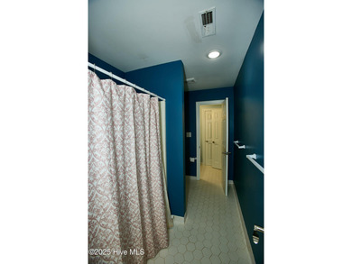 Located on a corner lot at Wilson Country Club overlooking Hole on Wilson Country Club in North Carolina - for sale on GolfHomes.com, golf home, golf lot