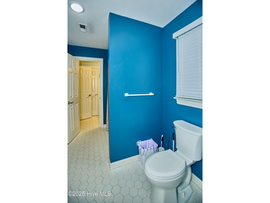 Located on a corner lot at Wilson Country Club overlooking Hole on Wilson Country Club in North Carolina - for sale on GolfHomes.com, golf home, golf lot