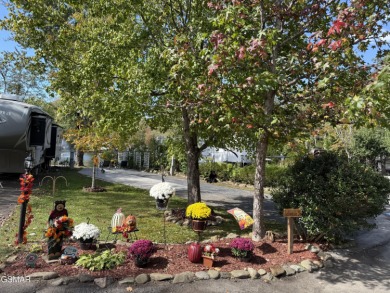 Beautifully landscaped LAKEFRONT RV lot in the sought after on Bent Creek Golf Course in Tennessee - for sale on GolfHomes.com, golf home, golf lot