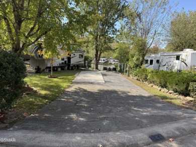 Beautifully landscaped LAKEFRONT RV lot in the sought after on Bent Creek Golf Course in Tennessee - for sale on GolfHomes.com, golf home, golf lot