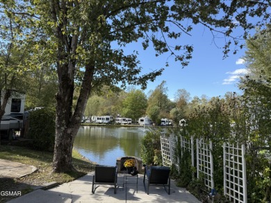 Beautifully landscaped LAKEFRONT RV lot in the sought after on Bent Creek Golf Course in Tennessee - for sale on GolfHomes.com, golf home, golf lot