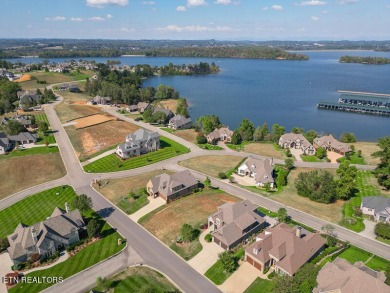 Amazing Lake and Mountain Views! Enjoy breath-taking sunrises on Wind River Golf Course in Tennessee - for sale on GolfHomes.com, golf home, golf lot