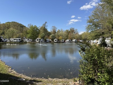 Beautifully landscaped LAKEFRONT RV lot in the sought after on Bent Creek Golf Course in Tennessee - for sale on GolfHomes.com, golf home, golf lot