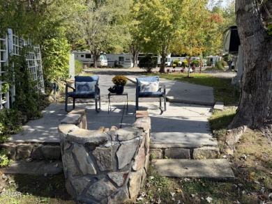 Beautifully landscaped LAKEFRONT RV lot in the sought after on Bent Creek Golf Course in Tennessee - for sale on GolfHomes.com, golf home, golf lot