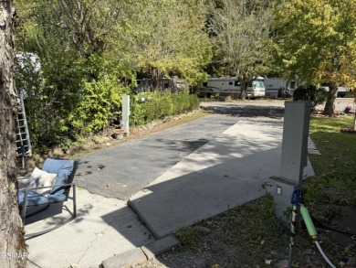 Beautifully landscaped LAKEFRONT RV lot in the sought after on Bent Creek Golf Course in Tennessee - for sale on GolfHomes.com, golf home, golf lot