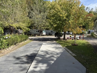 Beautifully landscaped LAKEFRONT RV lot in the sought after on Bent Creek Golf Course in Tennessee - for sale on GolfHomes.com, golf home, golf lot
