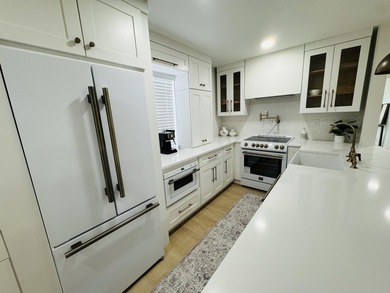 This upgraded designer unit will not last- FORNO appliances on Kings Point Golf -Flanders Way in Florida - for sale on GolfHomes.com, golf home, golf lot