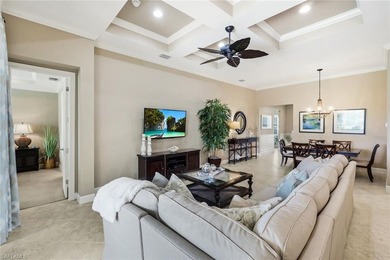 Enjoy stunning Naples sunsets from your private lanai in this on The Golf Lodge At the Quarry in Florida - for sale on GolfHomes.com, golf home, golf lot