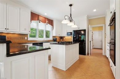 Experience elevated pond-front living at 300 Rivers Edge in on Kingsmill Resort and Golf Club in Virginia - for sale on GolfHomes.com, golf home, golf lot