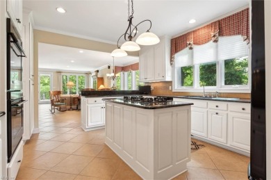 Experience elevated pond-front living at 300 Rivers Edge in on Kingsmill Resort and Golf Club in Virginia - for sale on GolfHomes.com, golf home, golf lot