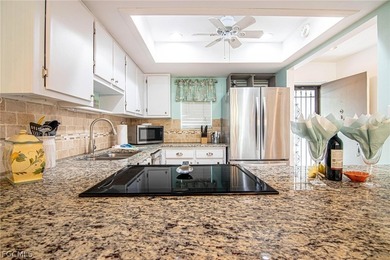 With a Golf Course View from your screened lanai and a fantastic on Cypress Lake Country Club in Florida - for sale on GolfHomes.com, golf home, golf lot