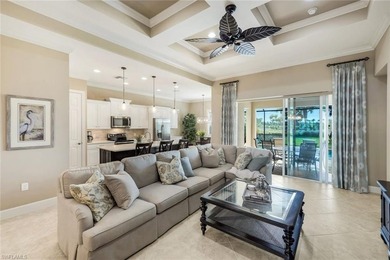 Enjoy stunning Naples sunsets from your private lanai in this on The Golf Lodge At the Quarry in Florida - for sale on GolfHomes.com, golf home, golf lot