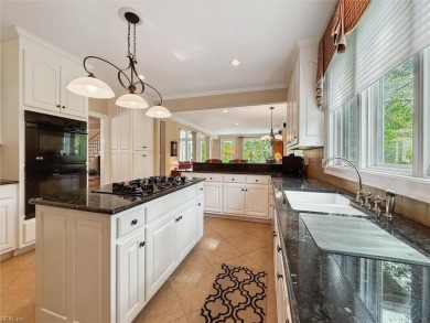 Experience elevated pond-front living at 300 Rivers Edge in on Kingsmill Resort and Golf Club in Virginia - for sale on GolfHomes.com, golf home, golf lot