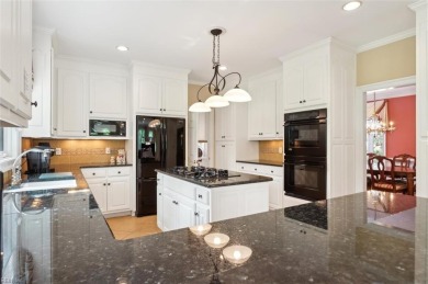 Experience elevated pond-front living at 300 Rivers Edge in on Kingsmill Resort and Golf Club in Virginia - for sale on GolfHomes.com, golf home, golf lot