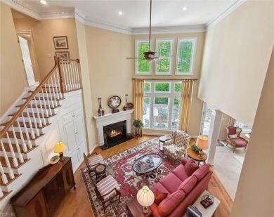 Experience elevated pond-front living at 300 Rivers Edge in on Kingsmill Resort and Golf Club in Virginia - for sale on GolfHomes.com, golf home, golf lot