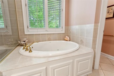 Experience elevated pond-front living at 300 Rivers Edge in on Kingsmill Resort and Golf Club in Virginia - for sale on GolfHomes.com, golf home, golf lot