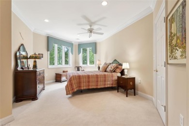 Experience elevated pond-front living at 300 Rivers Edge in on Kingsmill Resort and Golf Club in Virginia - for sale on GolfHomes.com, golf home, golf lot