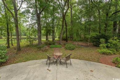 A stunning brick ranch style home with an inviting southern on Wachesaw Plantation Club in South Carolina - for sale on GolfHomes.com, golf home, golf lot