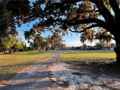 Wake up to sweeping golf course views and unwind in your own on Oaks National Golf Course in Florida - for sale on GolfHomes.com, golf home, golf lot
