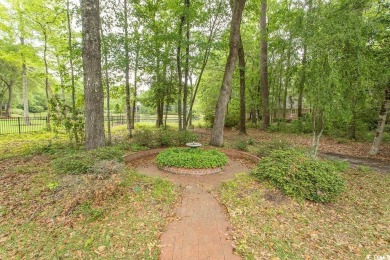 A stunning brick ranch style home with an inviting southern on Wachesaw Plantation Club in South Carolina - for sale on GolfHomes.com, golf home, golf lot