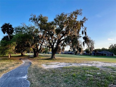 Wake up to sweeping golf course views and unwind in your own on Oaks National Golf Course in Florida - for sale on GolfHomes.com, golf home, golf lot