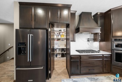 Thoughtfully designed custom ranch that sits in an eastside on Willow Run Golf Course in South Dakota - for sale on GolfHomes.com, golf home, golf lot