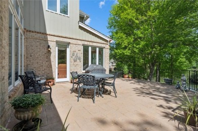 Experience elevated pond-front living at 300 Rivers Edge in on Kingsmill Resort and Golf Club in Virginia - for sale on GolfHomes.com, golf home, golf lot