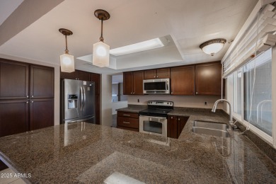 Tucked inside the vibrant, amenity-rich Dobson Ranch community on Dobson Ranch Municipal Golf Course in Arizona - for sale on GolfHomes.com, golf home, golf lot