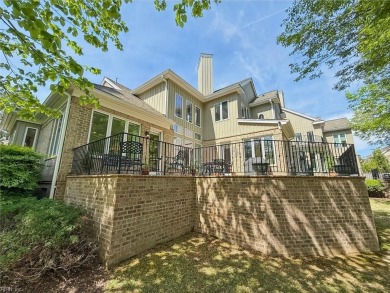 Experience elevated pond-front living at 300 Rivers Edge in on Kingsmill Resort and Golf Club in Virginia - for sale on GolfHomes.com, golf home, golf lot