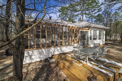 Experience effortless one-level living in this classic brick and on Ponce De Leon Golf Course in Arkansas - for sale on GolfHomes.com, golf home, golf lot