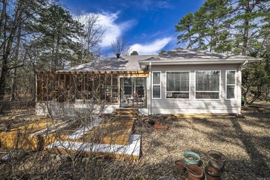 Experience effortless one-level living in this classic brick and on Ponce De Leon Golf Course in Arkansas - for sale on GolfHomes.com, golf home, golf lot