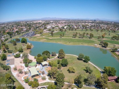 Tucked inside the vibrant, amenity-rich Dobson Ranch community on Dobson Ranch Municipal Golf Course in Arizona - for sale on GolfHomes.com, golf home, golf lot